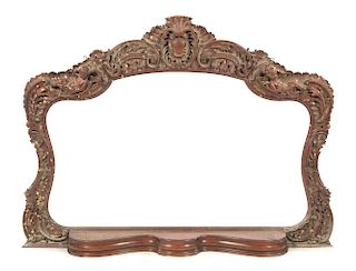 A Victorian Carved Overmantel Mirror Frame Width 49 1/4 inches.