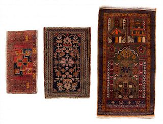 Three Persian Wool Rugs Largest 4 feet 1 inch x 2 feet 5 inches.