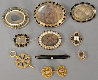 Group of ten pieces to include five mourning hair brooch, gold snake cufflinks, diamond horseshoe pin, and three other gold p