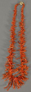 Graduated red coral branch necklace. lg. 20in.