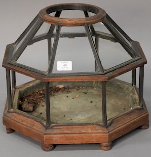 Walnut terrarium in the shape of an octagon (some glass missing/broke). ht. 13in., wd. 16in. Provenance: Estate of Arthur C. 