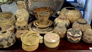 Twenty-five piece lot of various baskets, mostly late 20th century. largest dia. 29 1/2in. Provenance: Estate of Arthur C. Pi
