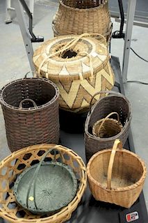 Group of eight various baskets. dia. 7in. to 20in. Provenance: Estate of Arthur C. Pinto, MD