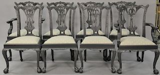 Set of eight black painted Chippendale style dining chairs, two armchairs and six side chairs.