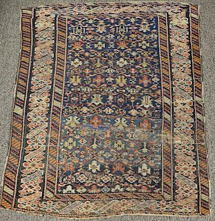 Three Oriental throw rugs. (4' x 3'4"), (3' x 4'6"), and (2'6" x 4'6")