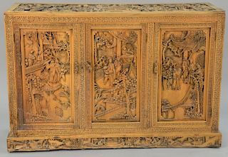 Carved Chinese three door cabinet. ht. 41in., wd. 60in., dp. 21in.