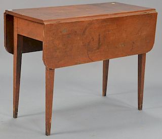 Federal maple drop leaf table in red finish, circa 1800. ht. 29in., top: 16" x 38" Provenance: Estate of Arthur C. Pinto, MD