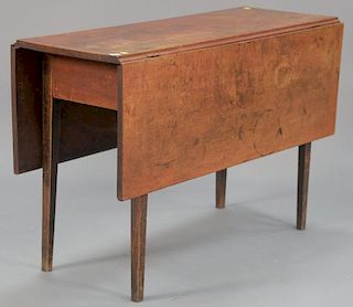 Federal maple drop leaf table in old red wash. ht. 27 1/2in., top: 15" x 43" Provenance: Estate of Arthur C. Pinto, MD