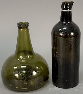 Two early bottles, one with spout. ht. 7 1/2in. and 9 1/2in. Provenance: Estate of Arthur C. Pinto, MD