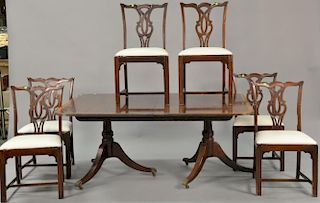 Ten piece dining set with eight Chippendale style chairs, a Baker banded inlaid table with three 18inch leaves, and a sideboa