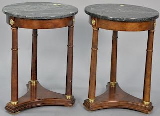 Pair of round marble top stands. ht. 24in., dia. 18in.