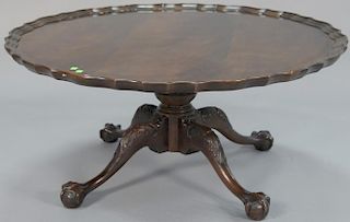 Henredon mahogany piecrust coffee table with ball and claw feet. ht. 19in., dia. 43in.
