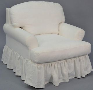 Custom white upholstered easy chair.