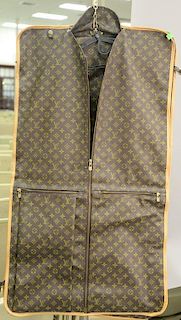 Vintage Louis Vuitton garment bag suitcase for suits with LV monogram. ht. 40in., wd. 22in.
