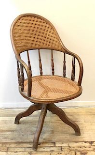 Victorian Walnut Caned Swivel Chair