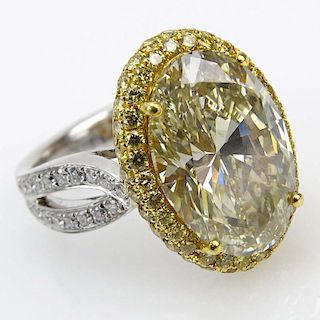 GIA Certified 7.04 Carat Oval Brilliant Cut Fancy Gray-Greenish Yellow Diamond and 18 Karat Yellow and White Gold Engagement 