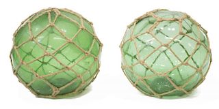 (2) NETTED BLOWN GREEN GLASS FISHING FLOATS