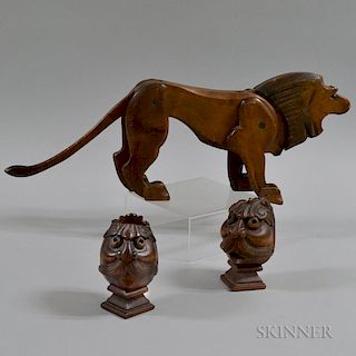 Carved Lion with Articulated Limbs and Two Carved Face Brackets/Finials