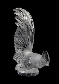 A Lalique Molded and Frosted Glass Mascot, Height 9 inches.