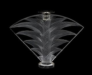 A Lalique Molded and Frosted Glass Candlestick, Height 8 inches.
