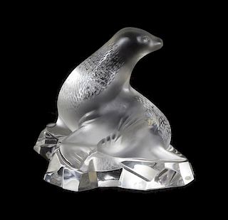 A Lalique Molded and Frosted Glass Figure, Width 7 1/4 inches.