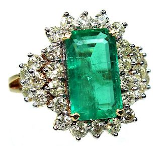 A Ladies 14 Karat Emerald & Diamond Ring