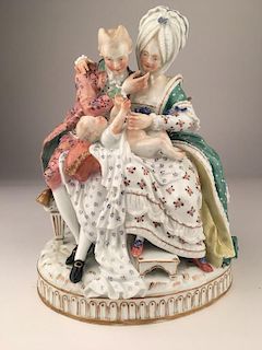 Circa 1774 Meissen figurine of new parents with new baby.