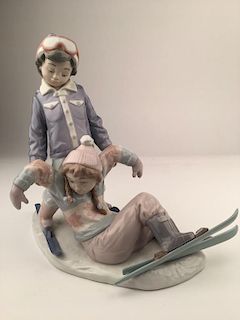 Vintage Lladro gloss figurine of two young skiers,