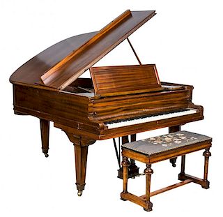 A Baldwin Baby Grand Piano Length of case 68 inches overall.