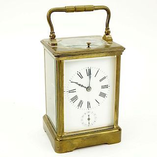 Late 19th Century French Aiguilles Gilt Brass Carriage Clock. Porcelain dial with double display, Roman and Arabic numerals.