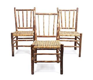 A Set of Thirteen Tavern Chairs Height 35 1/2 inches.