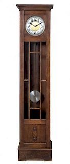 An Arts and Crafts Style Tall Case Clock Height 81 1/2 inches.