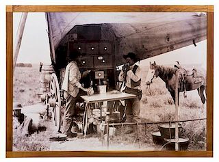 Laton A. Huffman, (American, 1854-1931), Roundup Cook and Pie Biter at Work