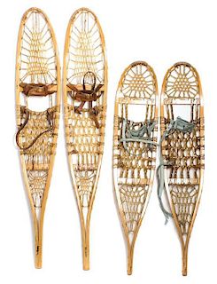Three Pairs of Vintage Snow Shoes. Length of longest pair 56 inches.