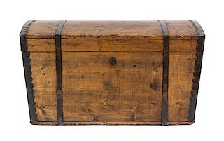 An Iron Mounted Domed Trunk Height 21 x width 37 7/8 x depth 17 inches.