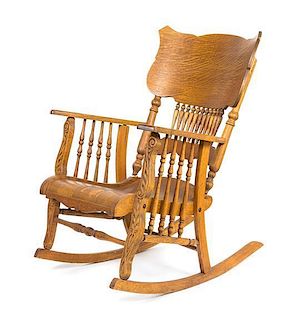 An American Oak Rocking Chair Height 37 1/2 inches.