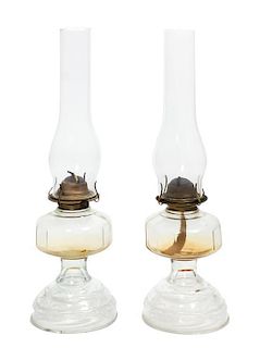 A Pair of Glass Oil Lamps Height 20 1/2 inches.