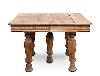 A Victorian Oak Extension Table Height 27 1/2 x width 41 1/2 x depth 41 1/2 inches (closed).