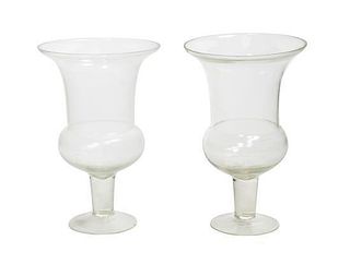 A Pair of Glass Urns Height 12 inches.