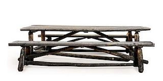 A Rustic Outdoor Dining Table and Two Benches Height of table 27 x width 95 1/2 x depth 30 1/2 inches.