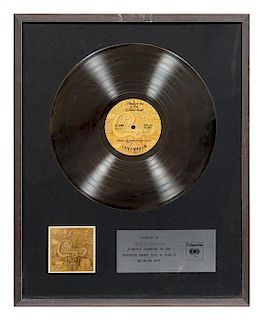 A Chicago VII Platinum Record Award Height 20 3/4 x width 16 3/4 inches (overall).