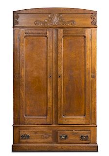 An American Armoire Retrofitted for Microphone Storage Height 86 x width 57 x depth 17 inches.
