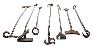 Seven Branding Irons. Length of longest 48 1/2 inches.