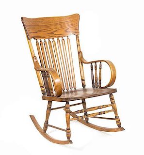 An American Oak Rocking Chair Height 37 inches.