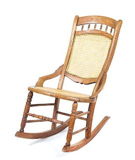 An American Pine Rocking Chair Height 33 inches.
