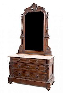 An Eastlake Style Mahogany Dresser Height 92 x width 48 1/2 x depth 22 1/2 inches.