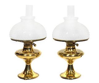 A Pair of American Brass Oil Lamps Height overall 21 inches.
