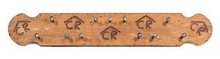 An Original Wood and Railroad Spike Coat Rack Length 71 3/4 inches.