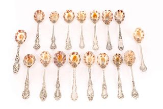 Group of 17 Seashell Mounted Sterling Spoons