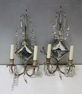 Pair of Silver Gilt Mirror Back Sconces.